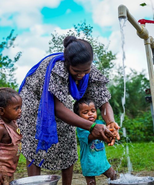 woman & child at well_2-Edit